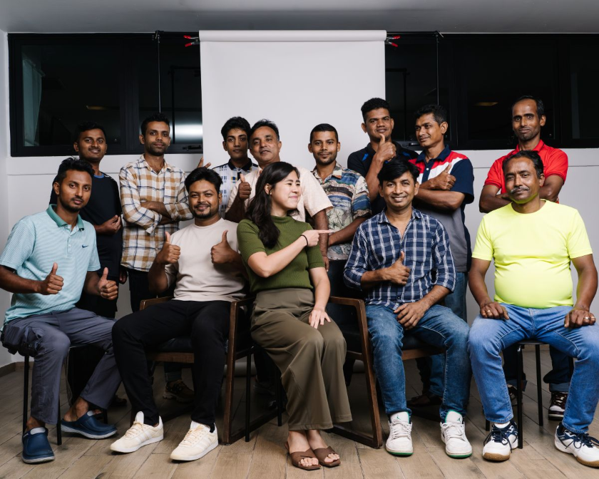 Charmaine with a group migrant workers